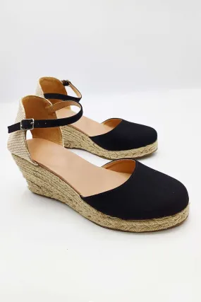 Mira Closed Toe Anklestrap Wedges in Black
